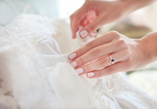 Carefully handling of a gown