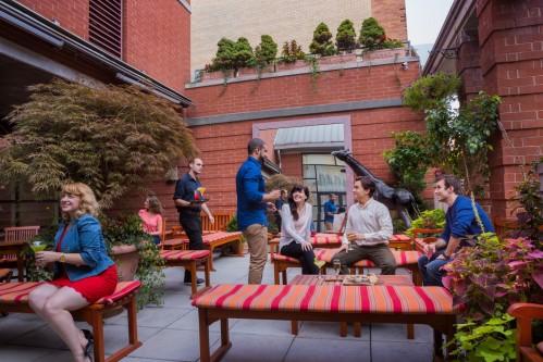 Relax and enjoy the quaint Rooftop Garden on the 12th floor of Hotel Giraffe. It even opens for cocktails during the summertime!