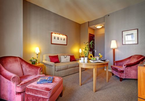 The living room of our Two Bedroom Suite has a full size sleeper sofa suitable for a 1 child or 1 young adult.